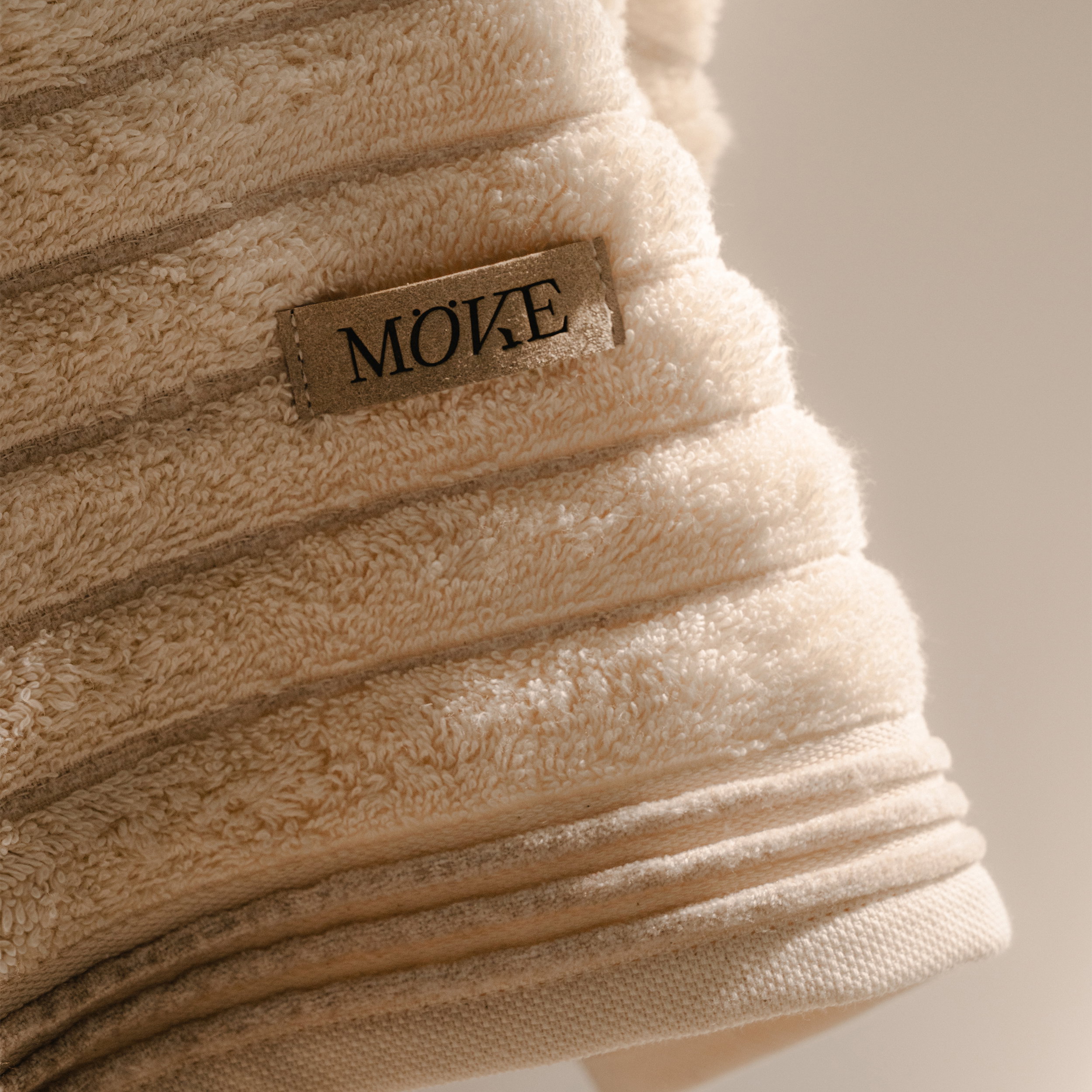 Handtuch, Beige, Textur, gefaltet, Etikett, Handtuch, Badezimmer, Beige, gefaltet, weich, Handtuch, Frottee, Beige, Gefaltet, Label